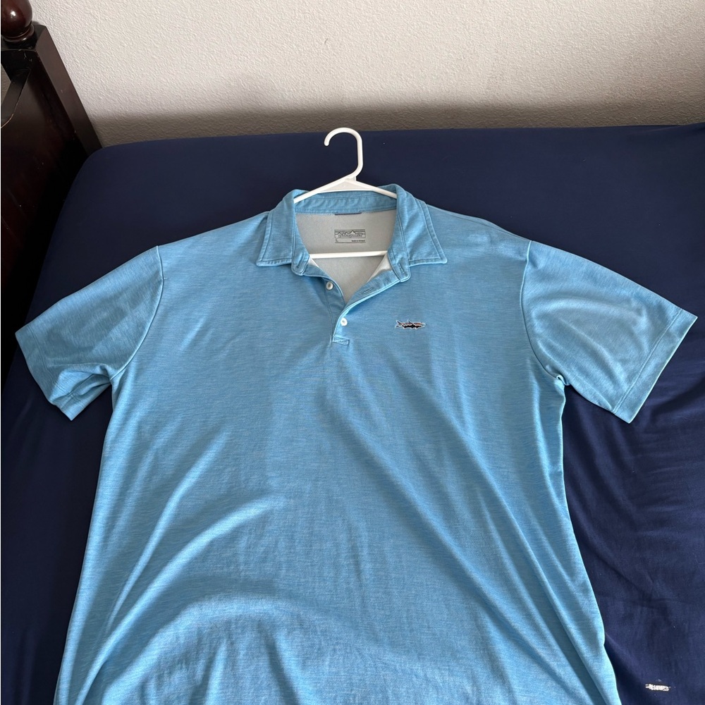 Patagonia Performance Fish Logo Polo Shirt.
Excellent condition
